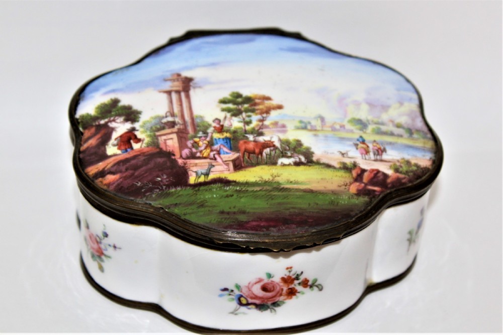 A large 18/19 century Bilston oval shaped enamel box nicely painted  View II