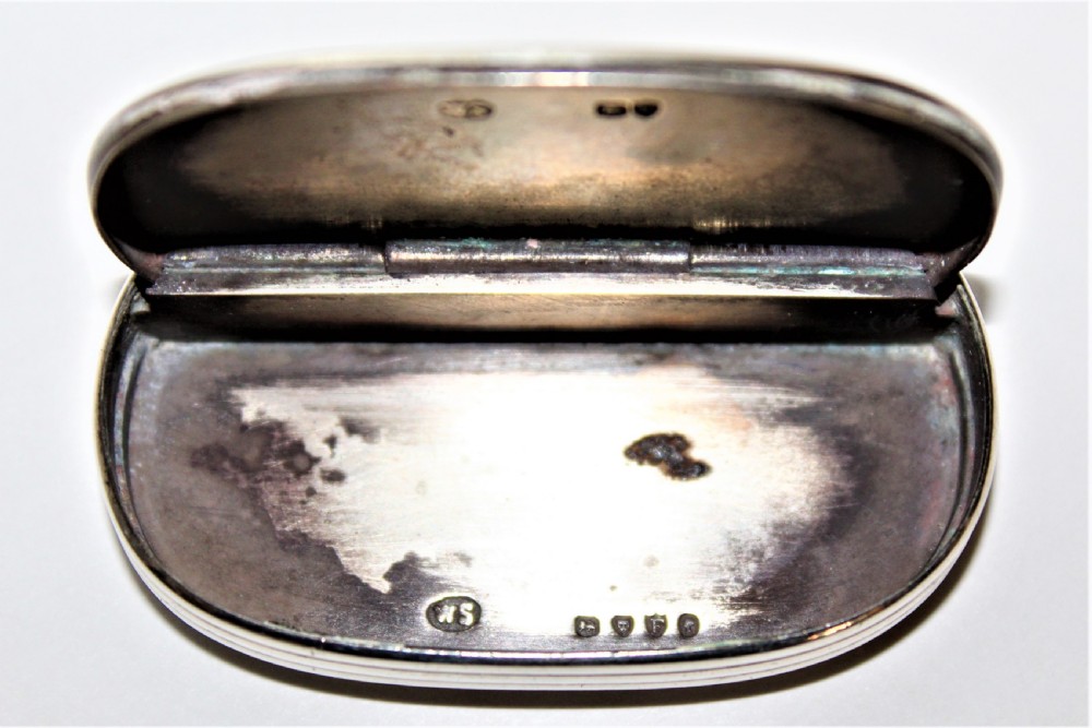 An unusual Victorian silver oval vesta case with reeded sides  View III