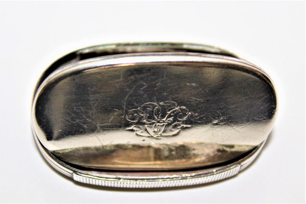 An unusual Victorian silver oval vesta case with reeded sides  View IV