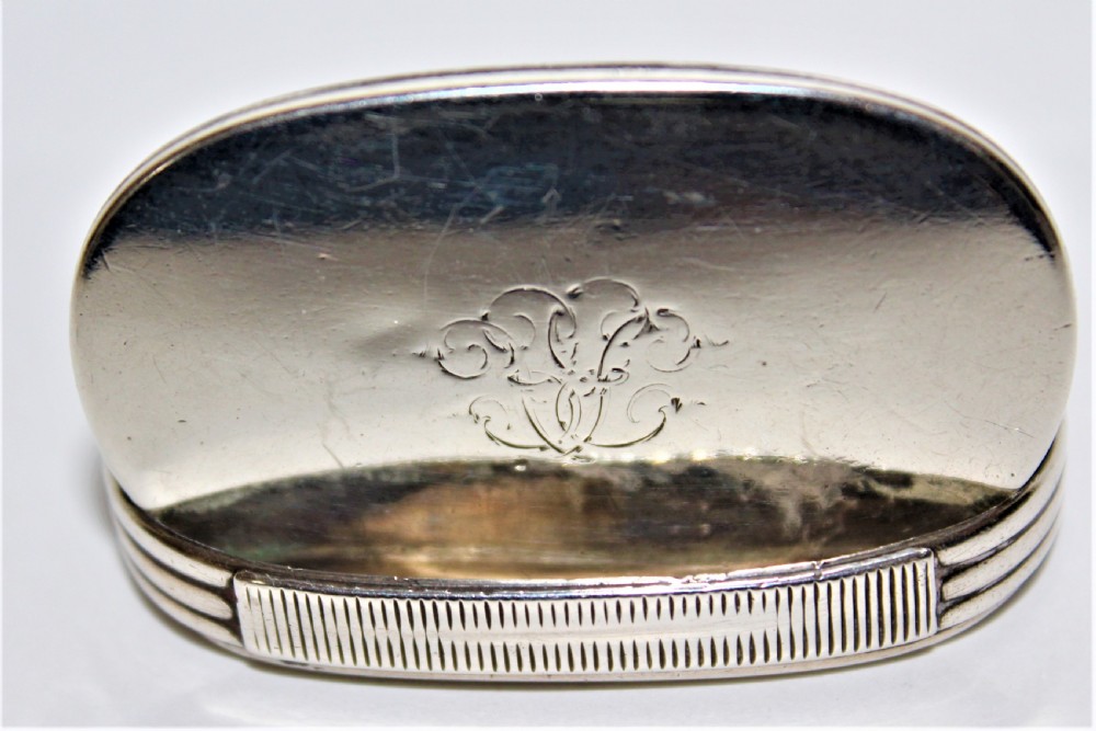 An unusual Victorian silver oval vesta case with reeded sides  View VII