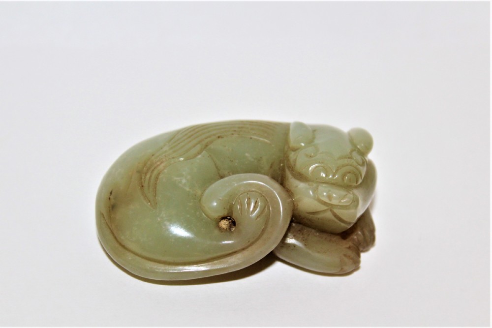 A finely carved Chinese celadon jade cat  View VII