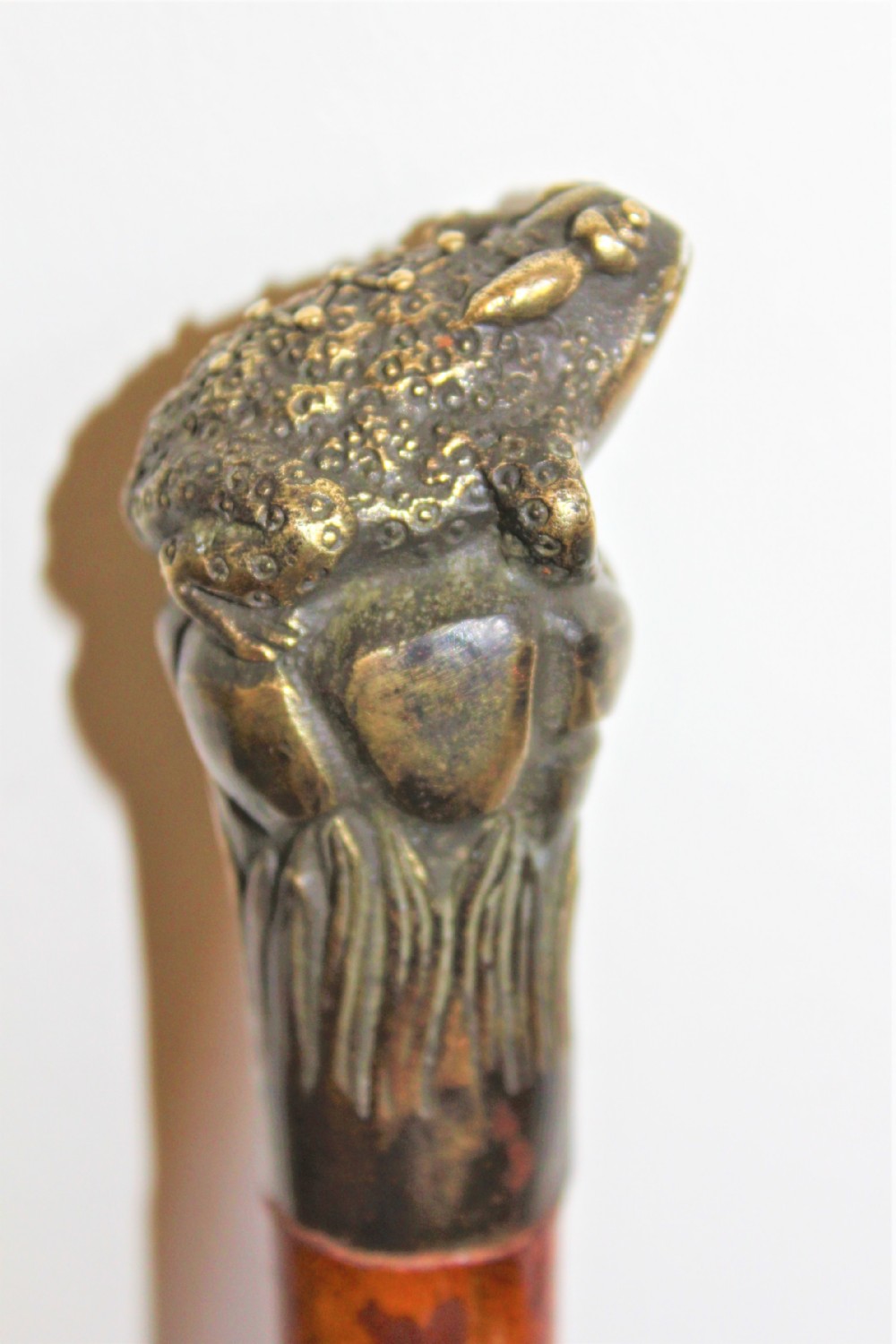 A good sturdy walking stick with a toad handle 