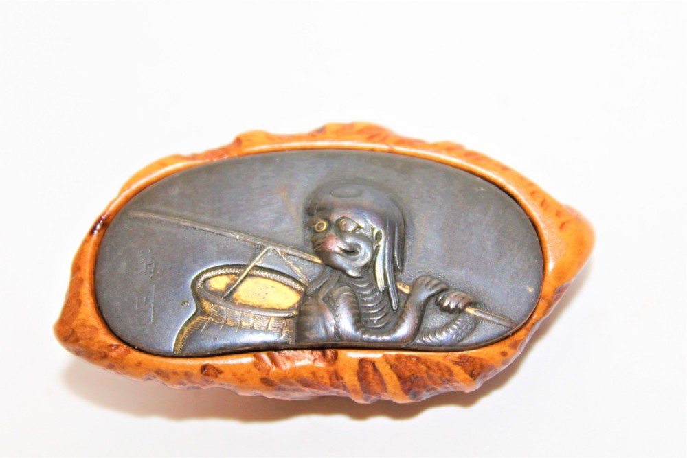 A fine Japanese boxwood Kagamibuta signed mixed metal netsuke 
