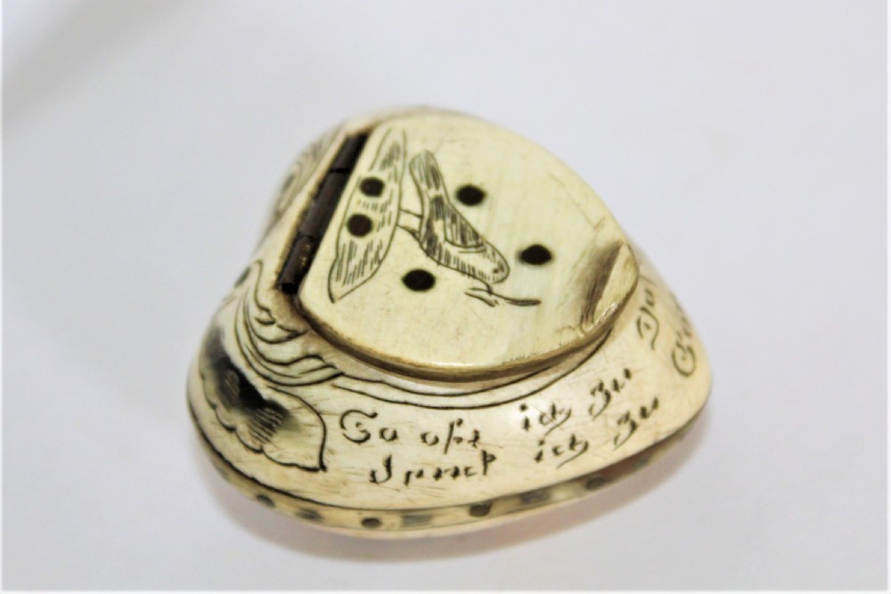 A 19th century small heart shaped horn box, possibly a love token 