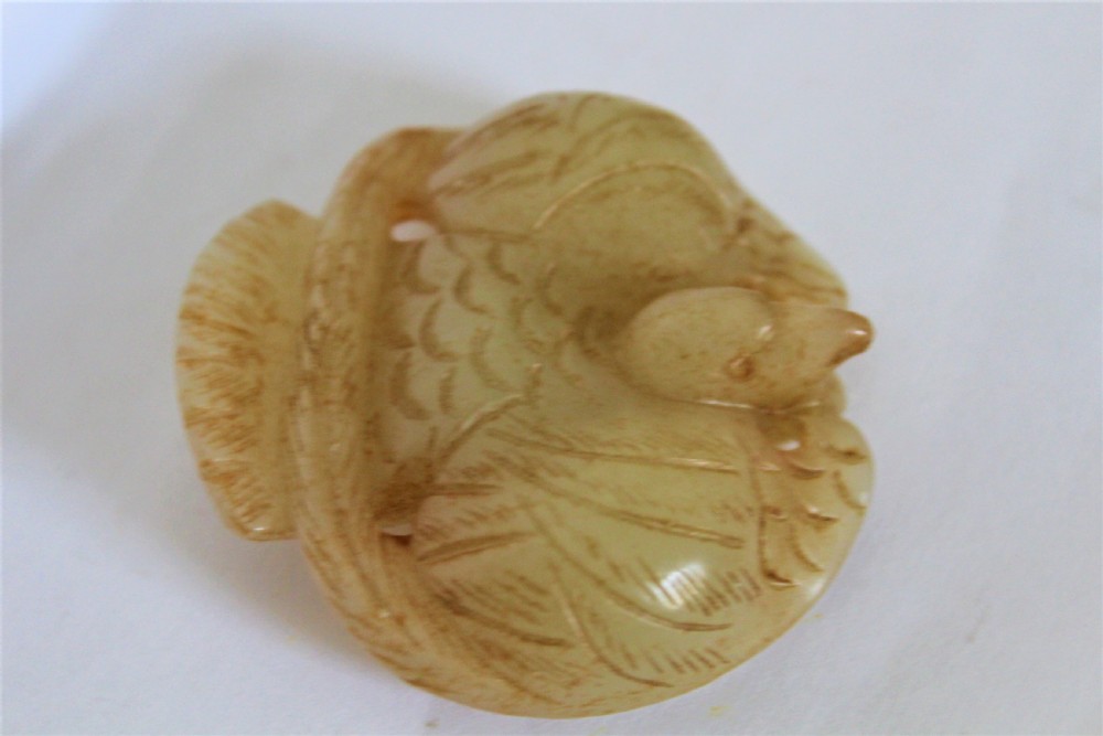A Chinese mythical bird pendant stylishly carved in jade  View III