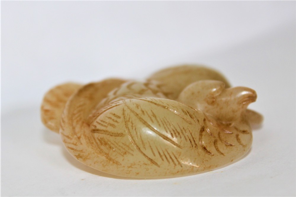 A Chinese mythical bird pendant stylishly carved in jade  View IV