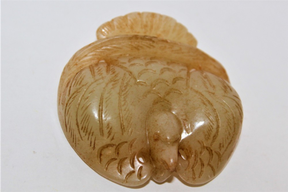 A Chinese mythical bird pendant stylishly carved in jade  View VI