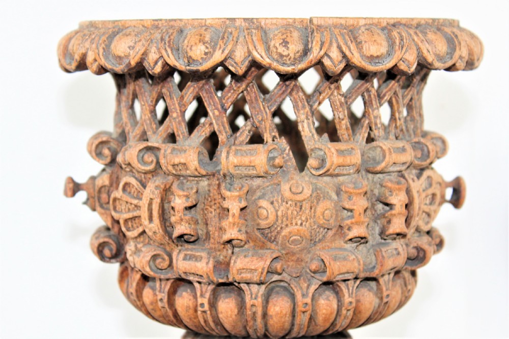 Carved wood jardiniere with pierced diaper and eccentric relief sides ,darted borders  and square base  View IV