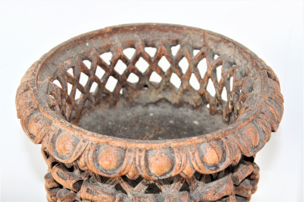 Carved wood jardiniere with pierced diaper and eccentric relief sides ,darted borders  and square base  View VIII