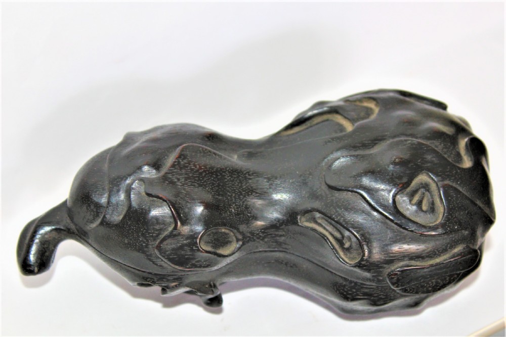 A fine and intricately carved wood Chinese box in the form of a gourd