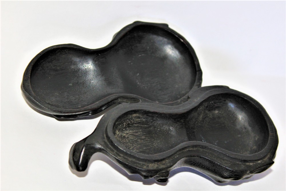 A fine and intricately carved wood Chinese box in the form of a gourd View V