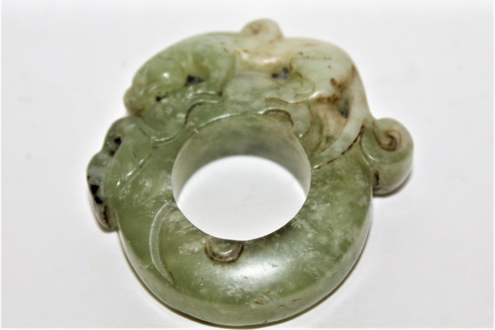 A well carved Chinese hard stone archers ring