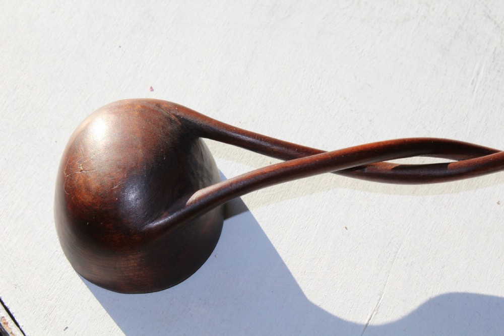 An unusual 18th Cen.carved hardwood toddy ladle made from one piece of wood  View VI