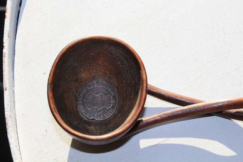 An unusual 18th Cen.carved hardwood toddy ladle made from one piece of wood  View III