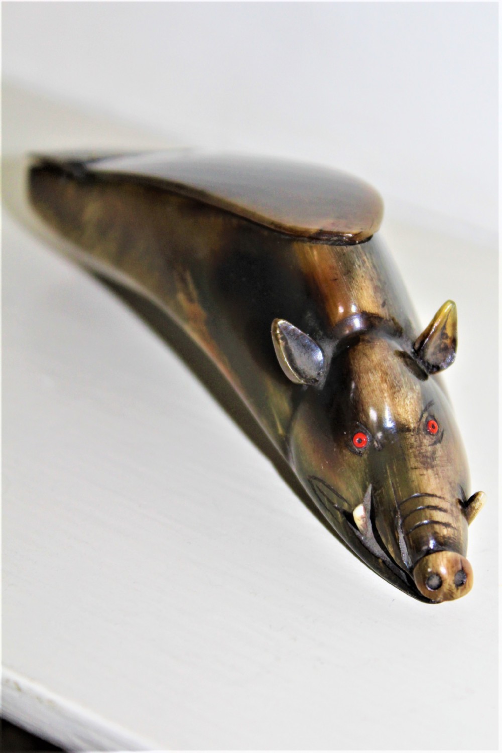 A Victorian novelty buffalo horn snuff box in the form of a wild boar 