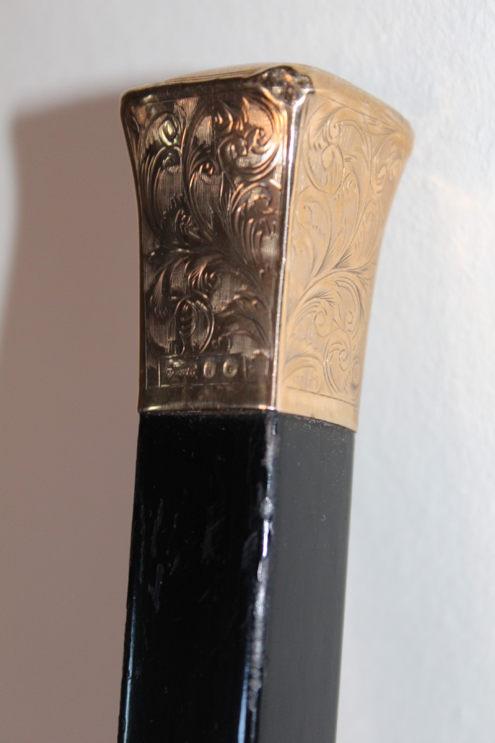 A very stylish gold topped walking stick  View II