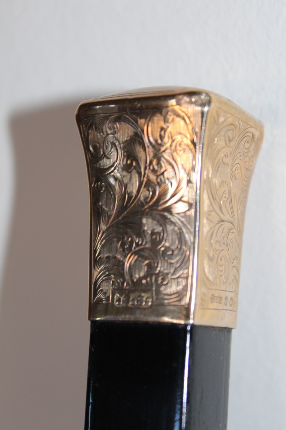 A very stylish gold topped walking stick  View III