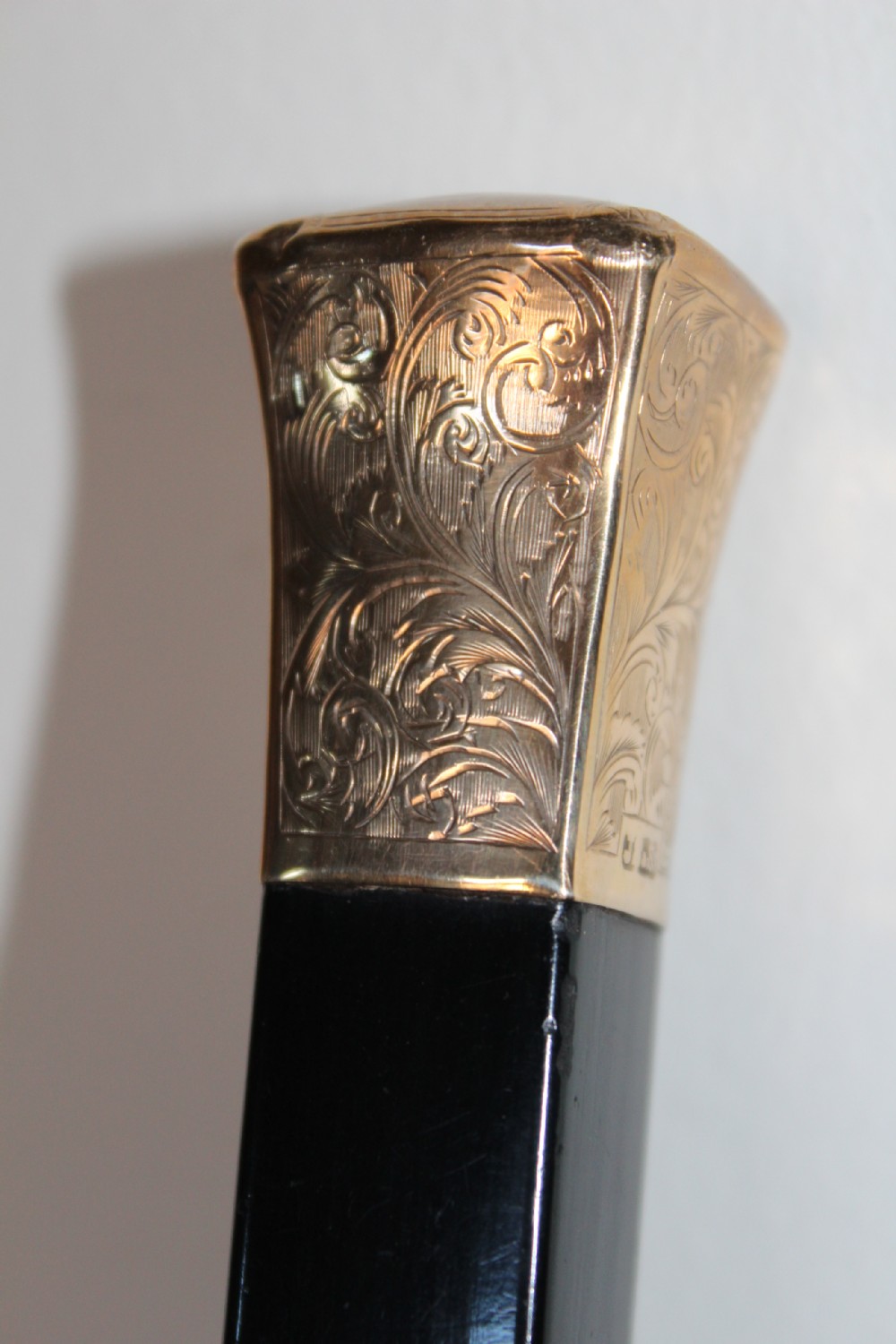 A very stylish gold topped walking stick  View IV