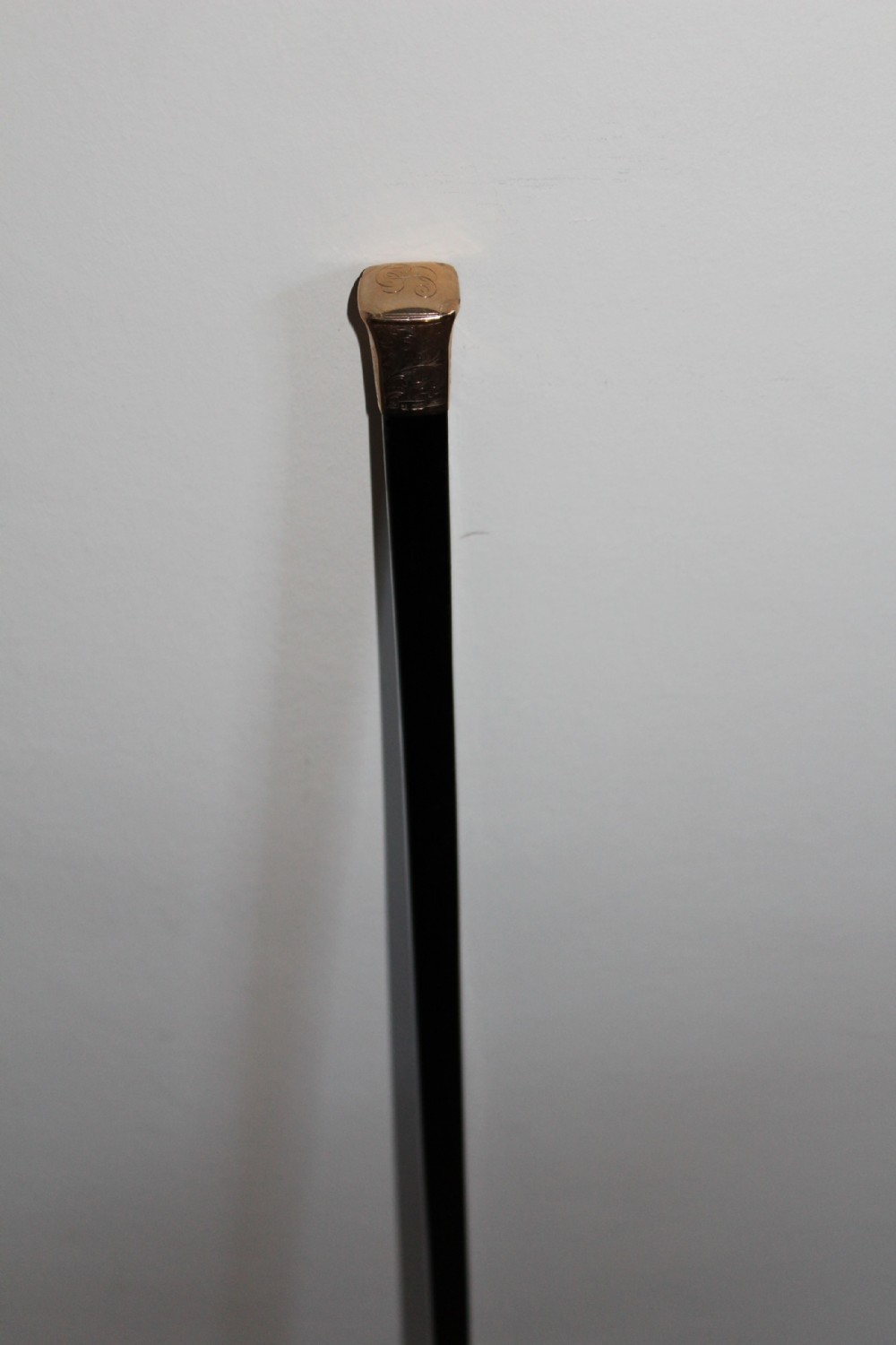 A very stylish gold topped walking stick  View VI