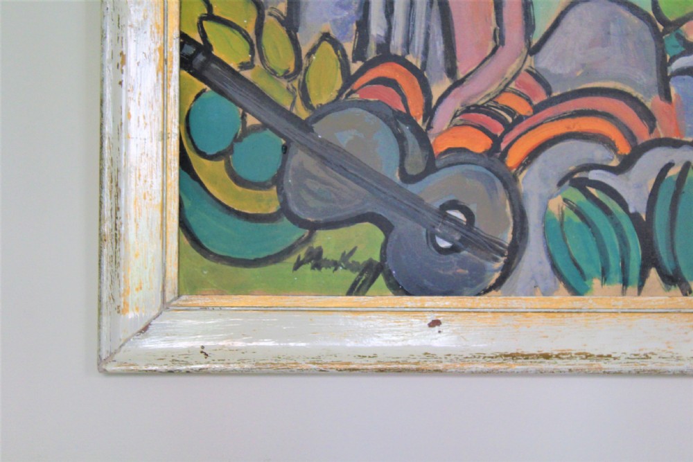 A framed expressionist oil painting depicting stylised figures, a guitar, and fruit against a coastal blue backdrop within a painted white wooden frame. View V
