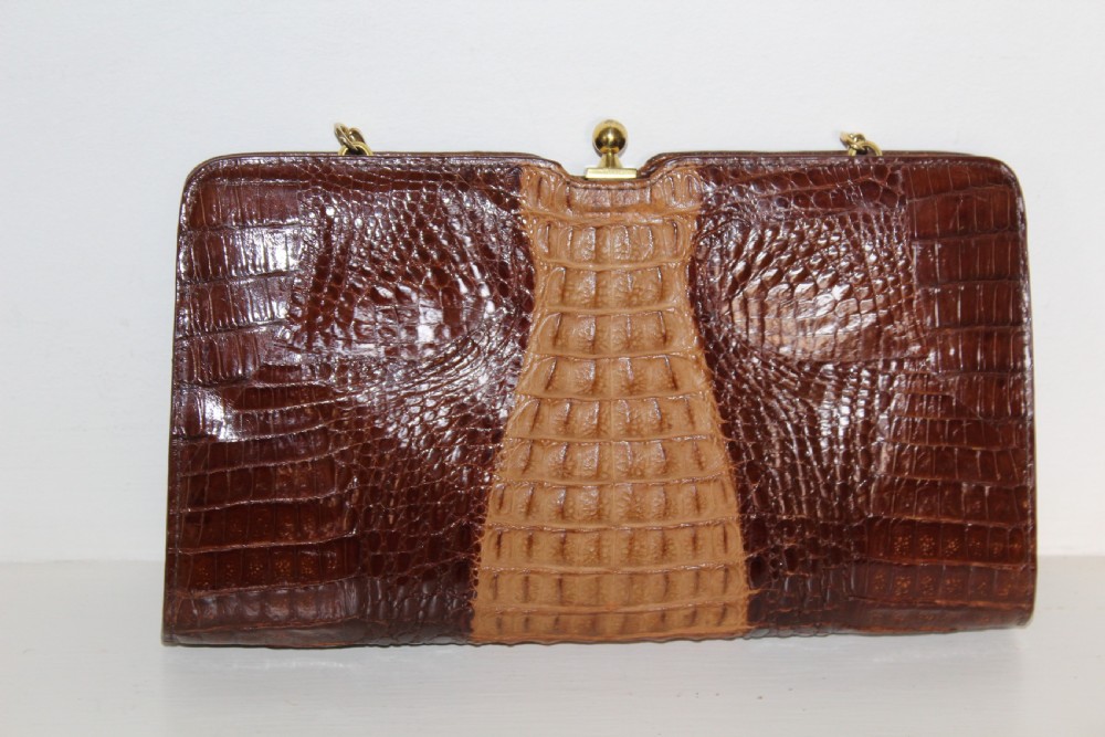 A 1930s Art Deco two-tone brown alligator skin handbag featuring a textured central hornback panel, top clasp closure, and a gilt metal chain strap. View III