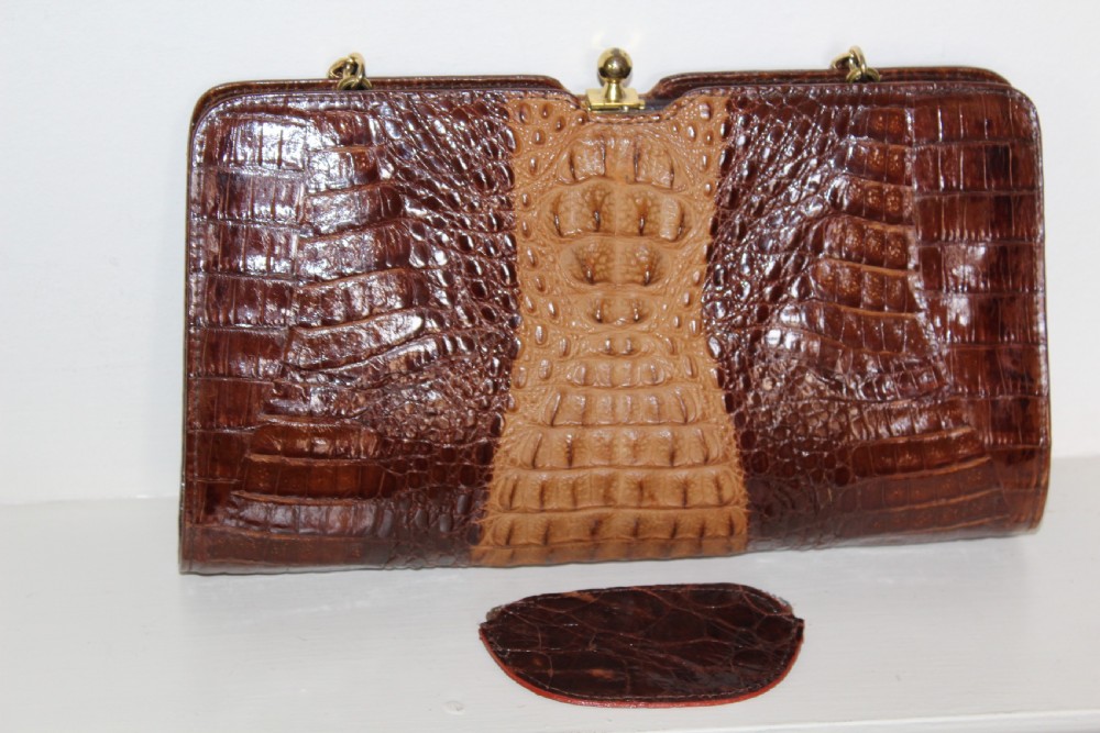 A 1930s Art Deco two-tone brown alligator skin handbag featuring a textured central hornback panel, top clasp closure, and a gilt metal chain strap. View XII