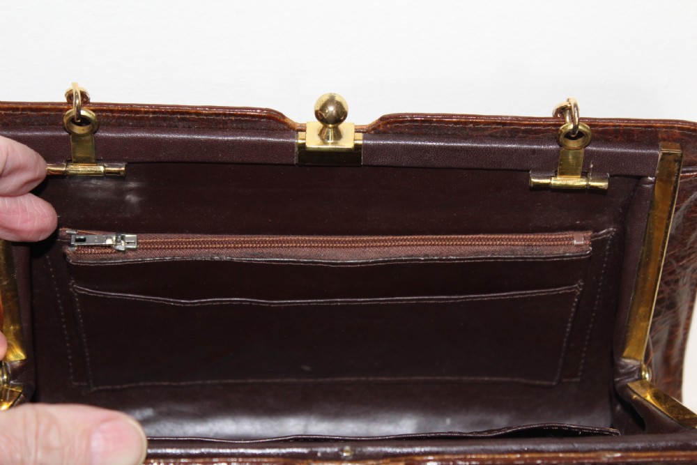 A 1930s Art Deco two-tone brown alligator skin handbag featuring a textured central hornback panel, top clasp closure, and a gilt metal chain strap. View XIII
