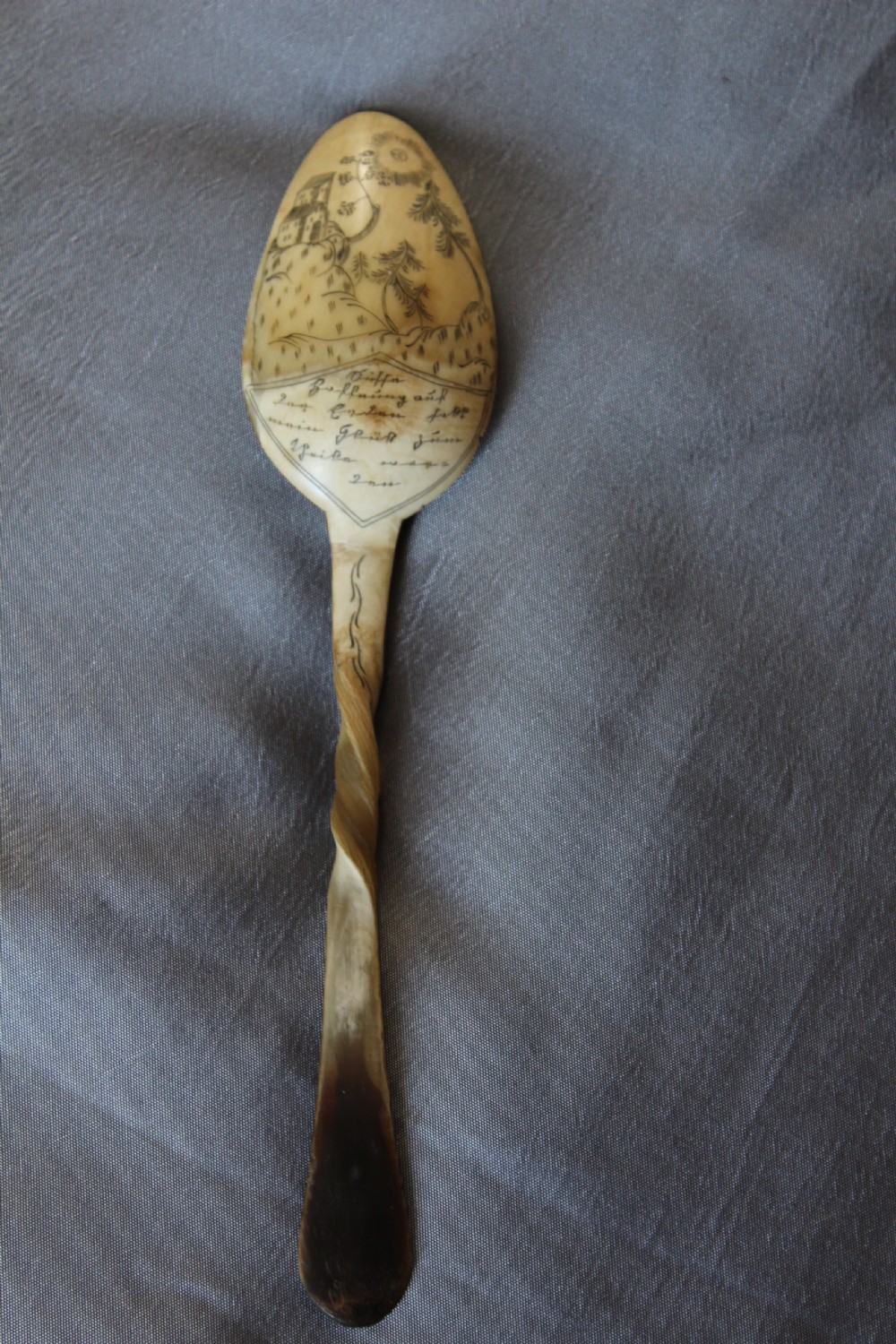 A German carved horn love spoon with scrimshaw Circa 1880