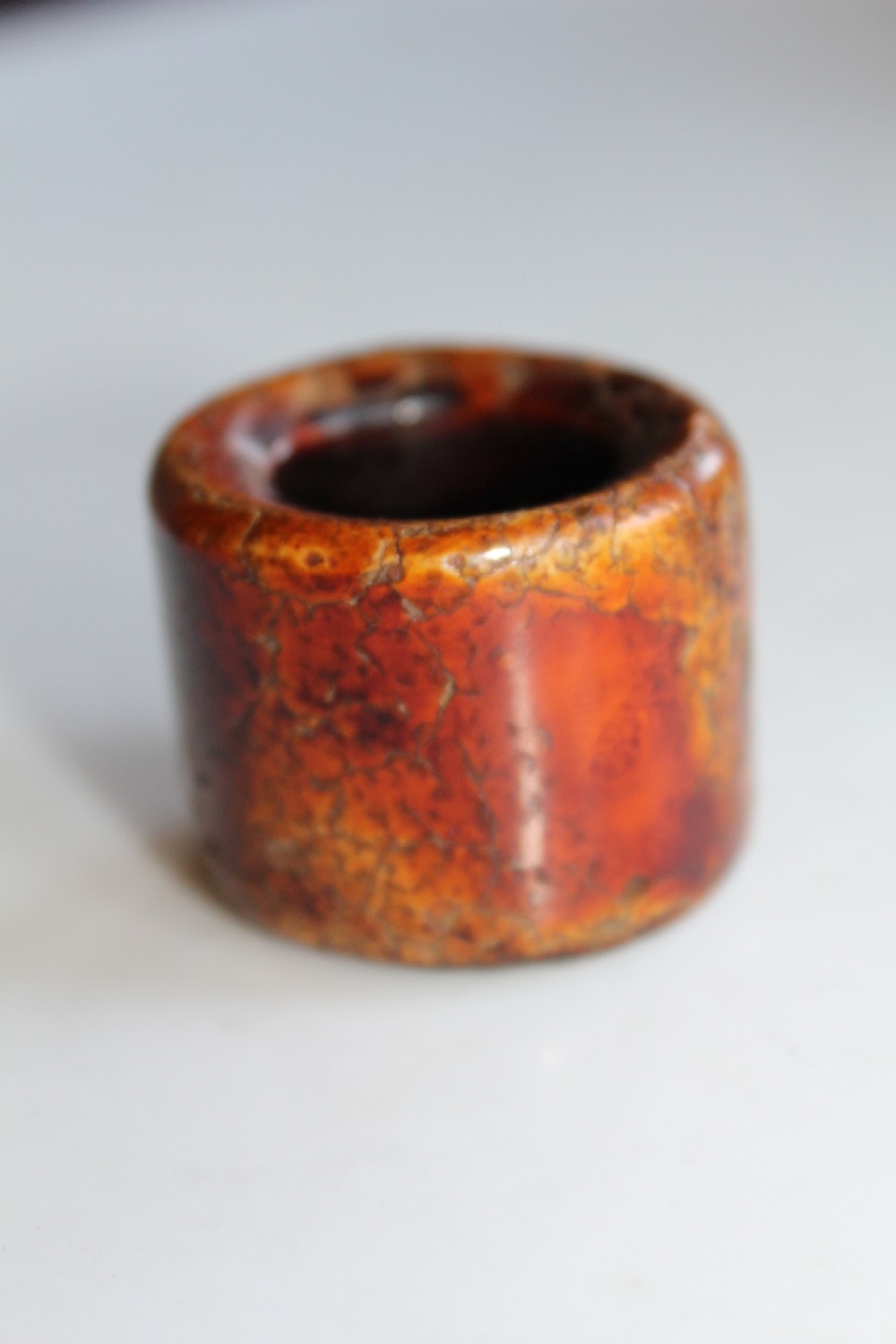 A very early carved stag horn archers ring 
