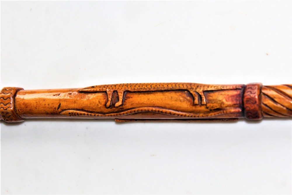 A charming well carved wood folk art walking stick  View III