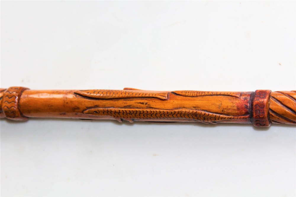 A charming well carved wood folk art walking stick  View IV