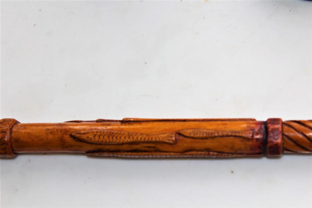 A charming well carved wood folk art walking stick  View V