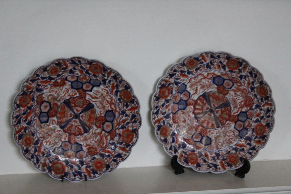 A pair of very finely painted and gilded imari plates View XII
