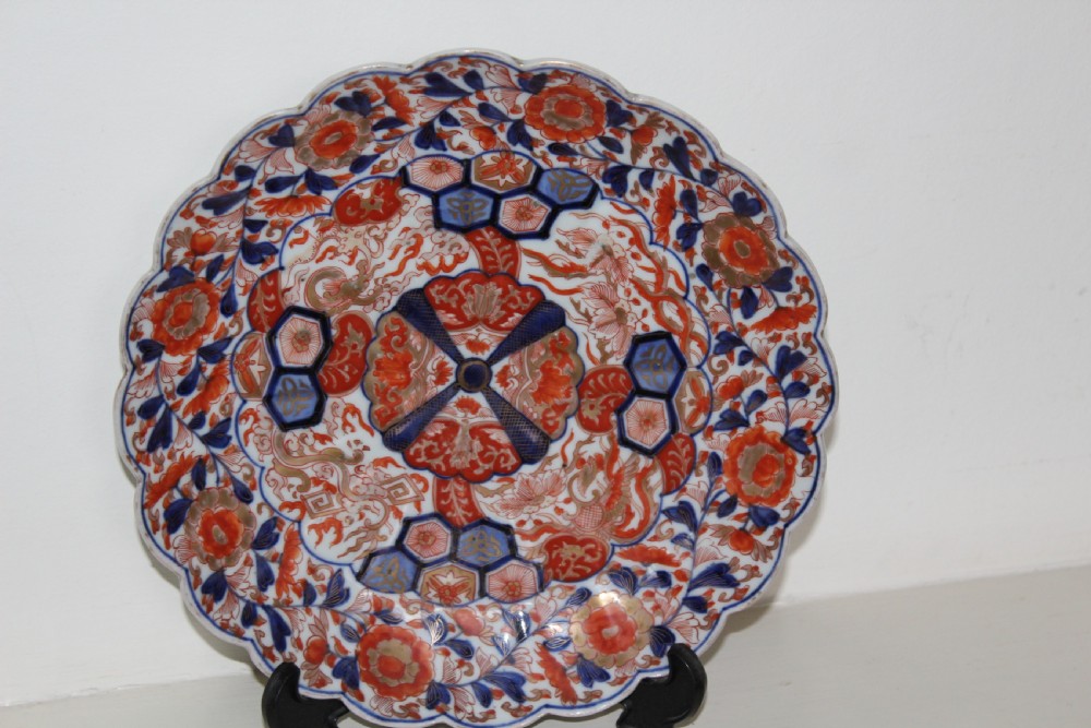 A pair of very finely painted and gilded imari plates View III