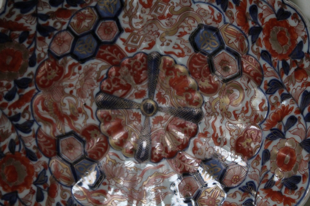 A pair of very finely painted and gilded imari plates View VIII
