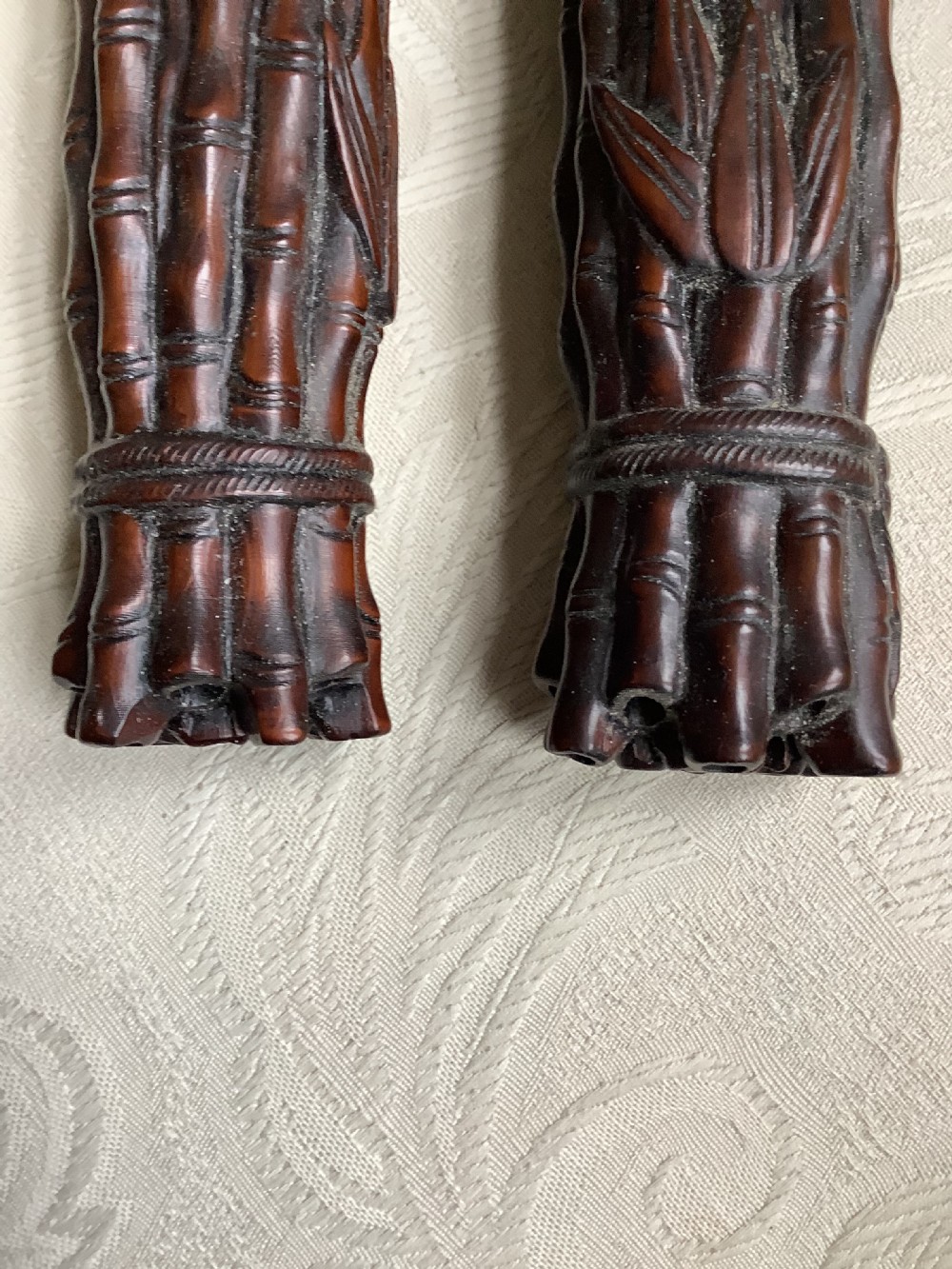 A pair of Chinese carved hardwood scroll weights  View V