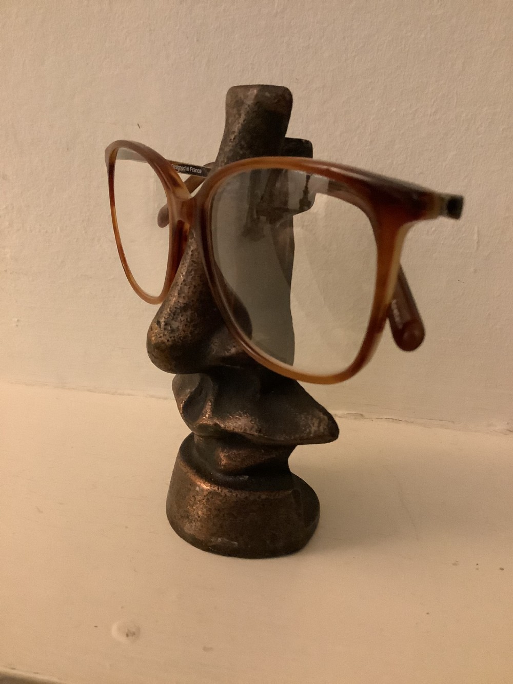 An unusual bronzed cast metal spectacle stand View VI