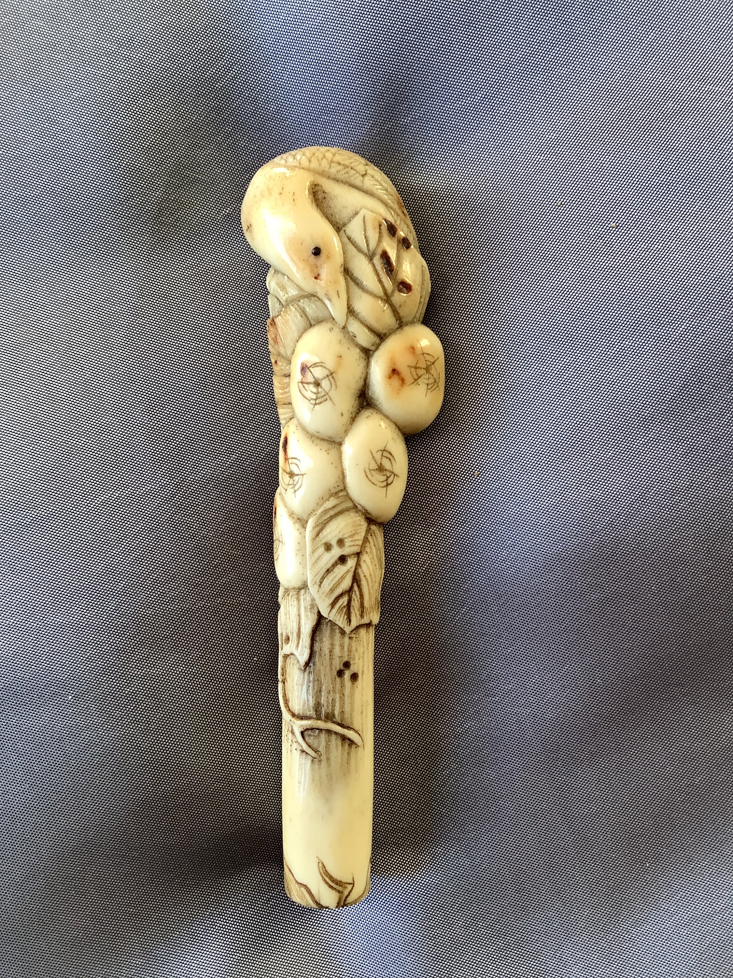 A finely carved oriental staghorn cane handle Circa 19 th century