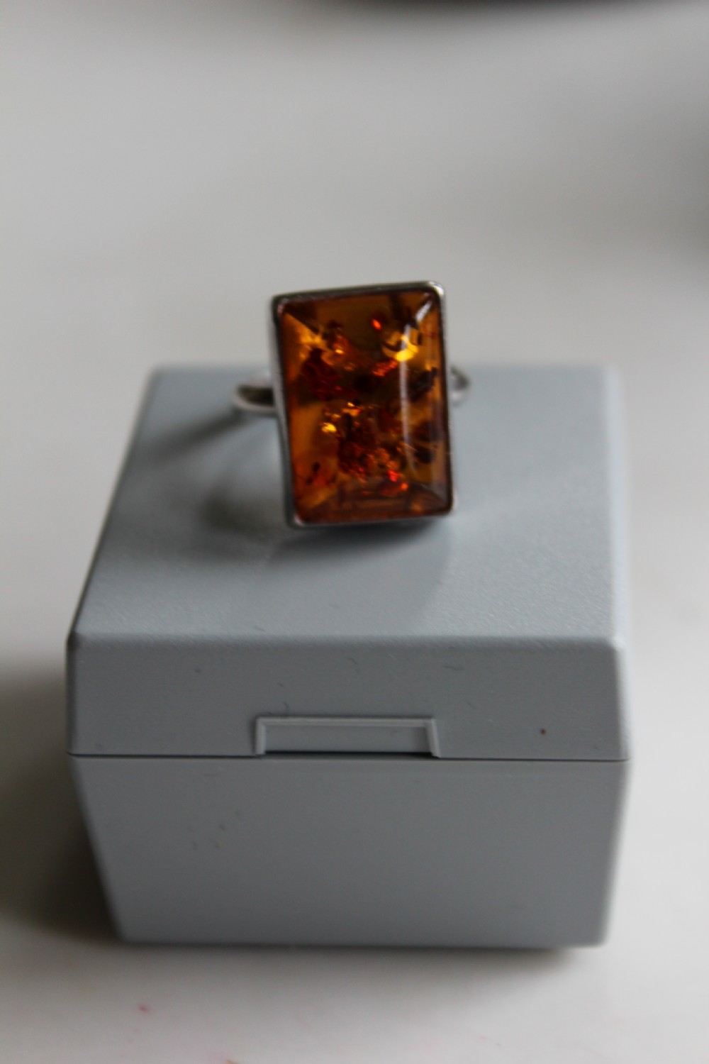 An attractive Amber ring mounted in silver  View IV