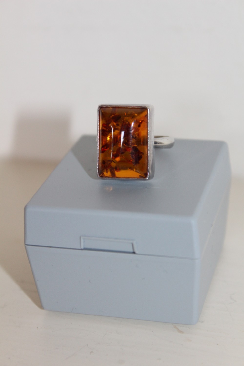 An attractive Amber ring mounted in silver  View VIII
