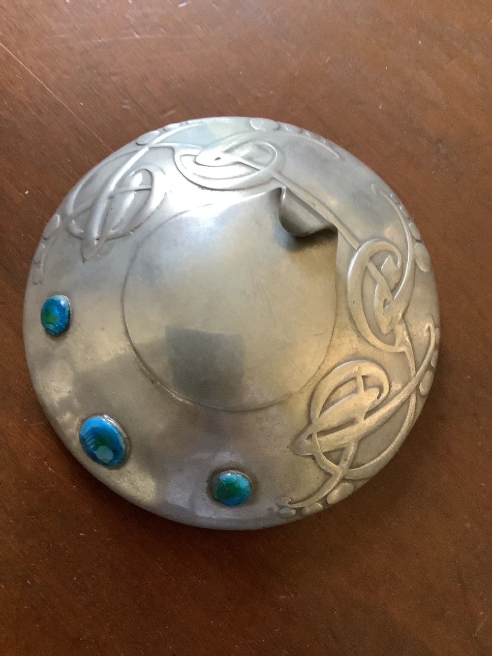 A very stylish Arts and Crafts Tudric Pewter circular ink well and liner after a design by Archibald Knox View II
