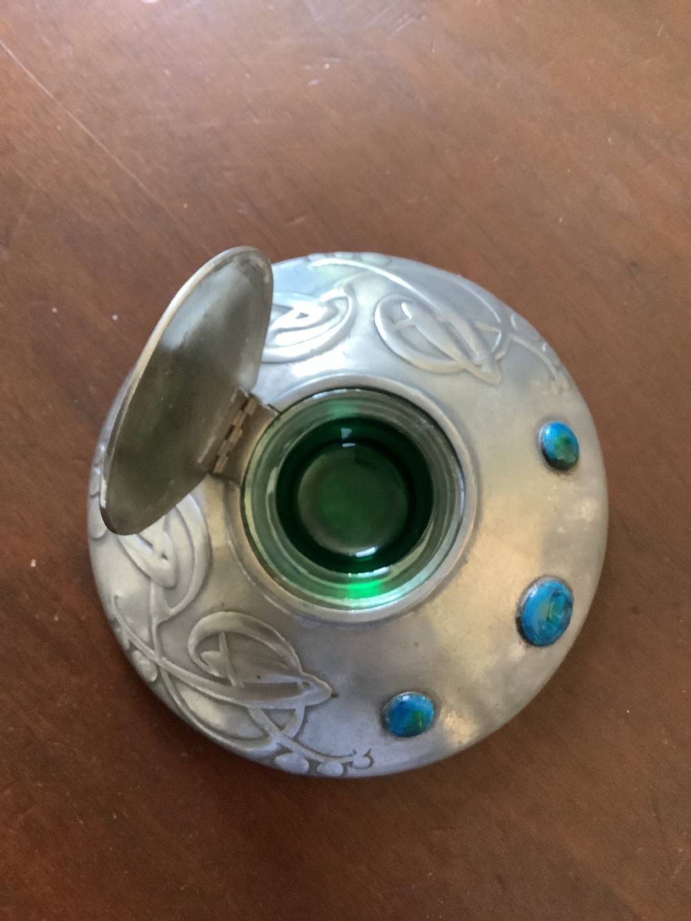 A very stylish Arts and Crafts Tudric Pewter circular ink well and liner after a design by Archibald Knox View III