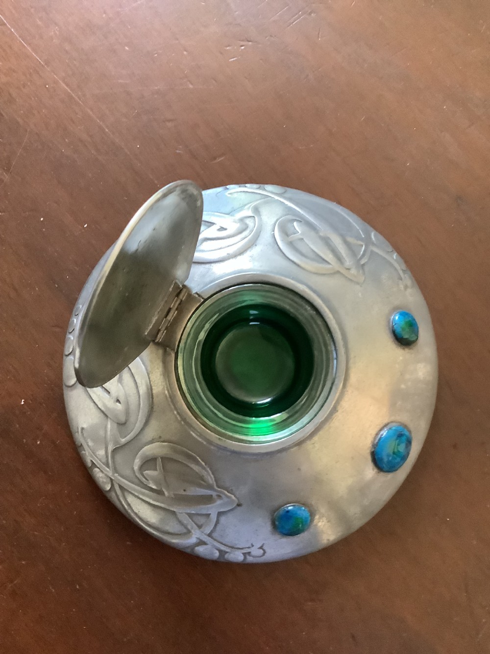 A very stylish Arts and Crafts Tudric Pewter circular ink well and liner after a design by Archibald Knox View IV