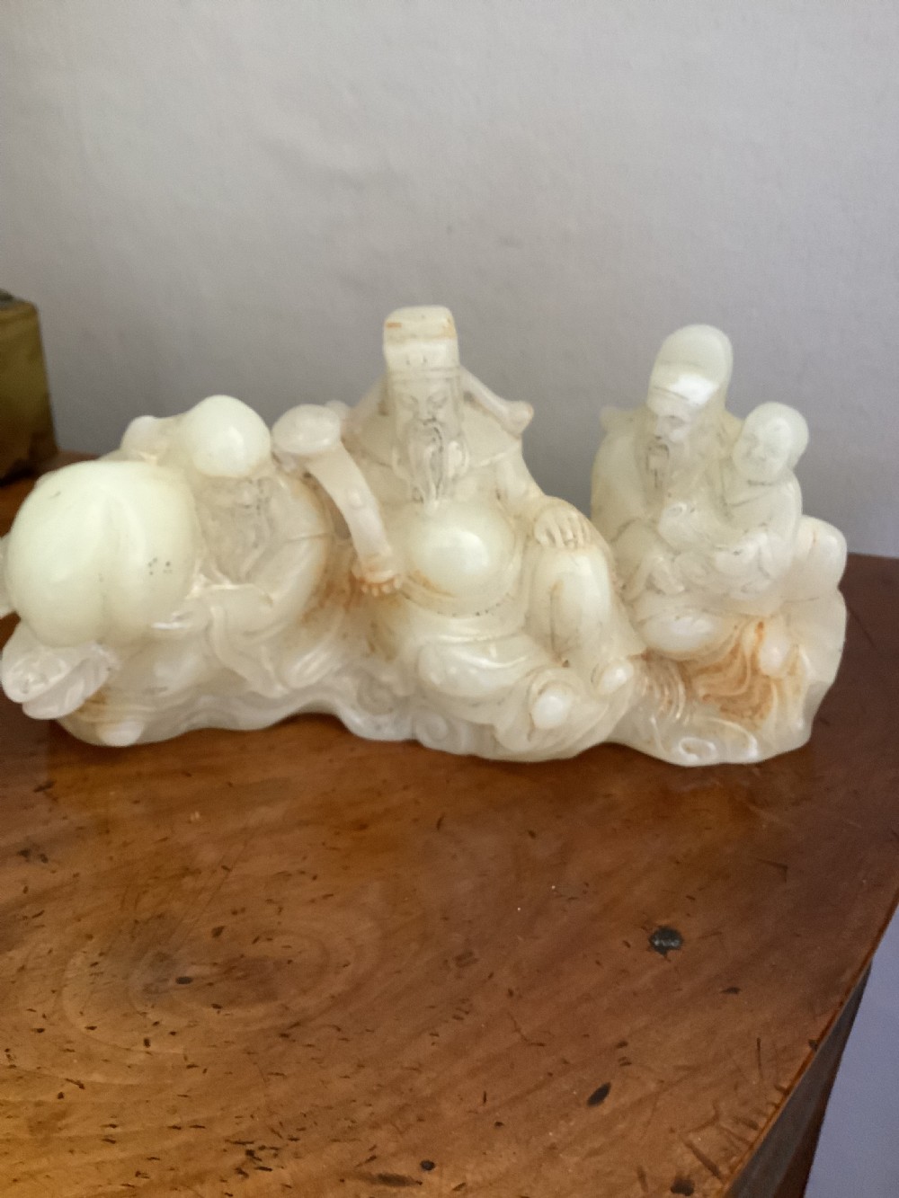A finely carved Chinese hardstone possibly jade figural brush fest  View VII