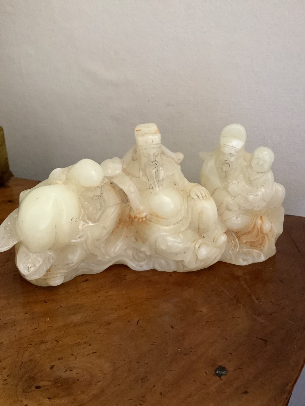 A finely carved Chinese hardstone possibly jade figural brush fest  View IV