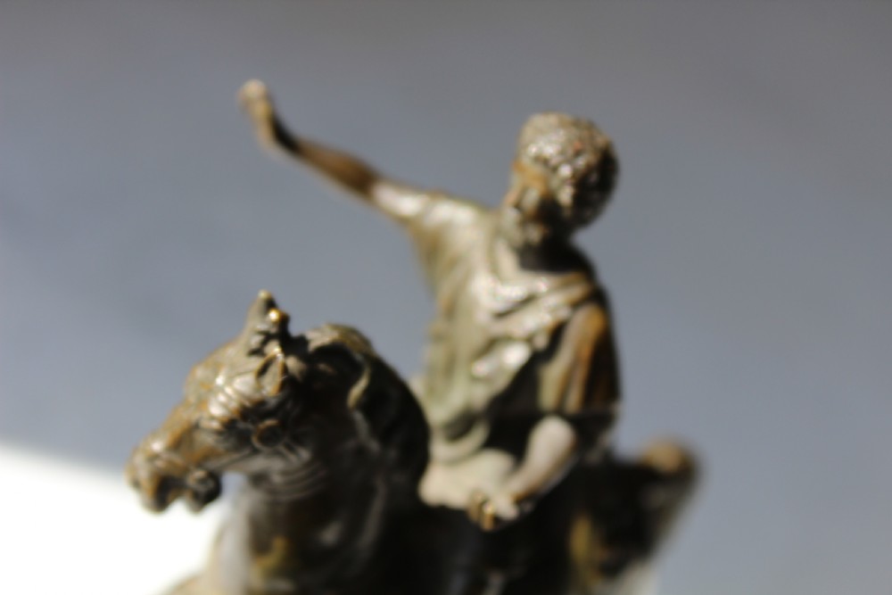 A very finely cast small Grand Tour bronze of an equestrian  View III