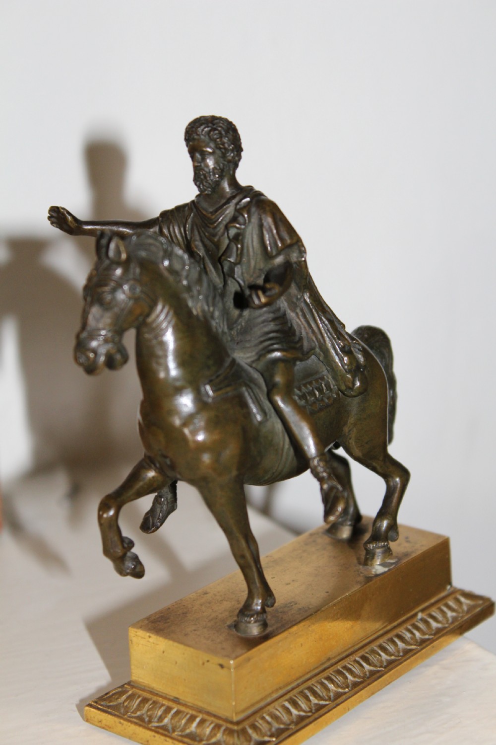 A very finely cast small Grand Tour bronze of an equestrian 