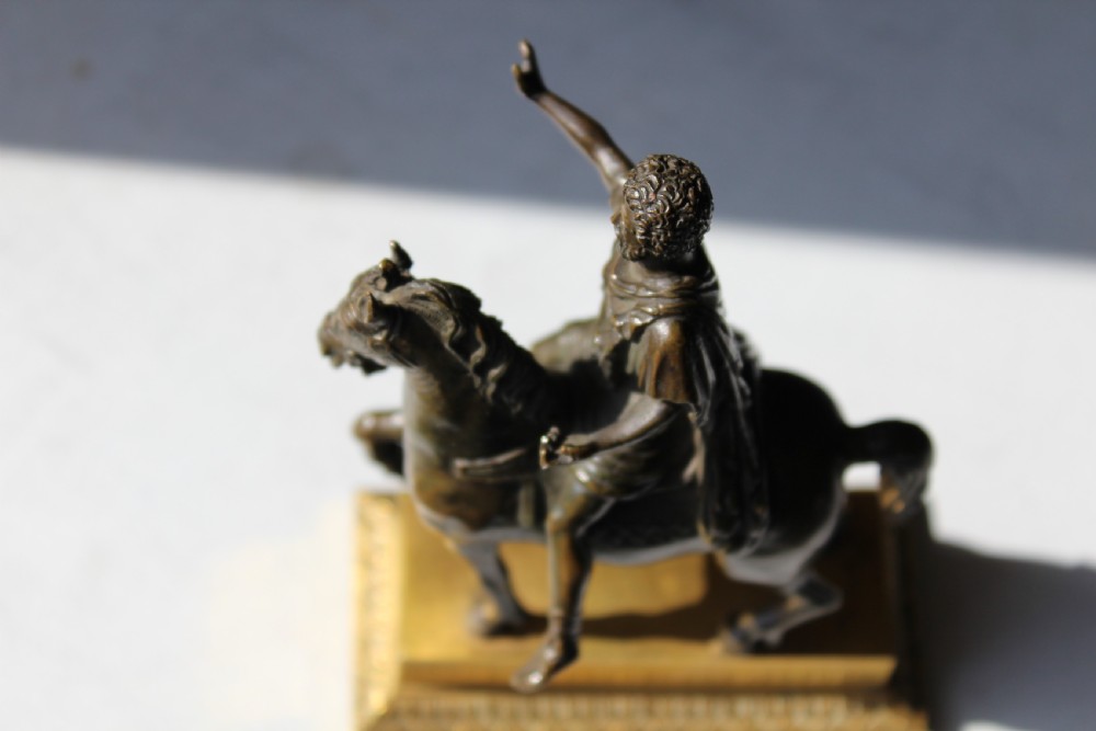 A very finely cast small Grand Tour bronze of an equestrian  View VII