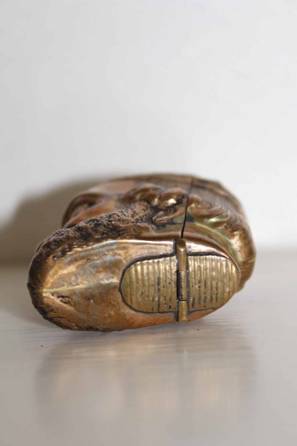 A finely cast and unusual brass vesta case in the form of a Roman classical bust View VII