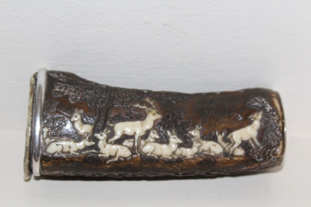 A superb and delightfully carved 19th century antler powder flask Comes with a letter of provenance View II